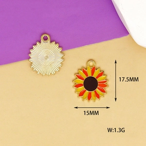 Detailed view of enamel sunflower charms showing 17.5mm size and golden textured back