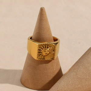 Vintage 18K gold plated stainless steel square sun ring on a wooden cone display