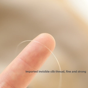 Detail of invisible high-strength nylon thread for natural pearl pendant necklace