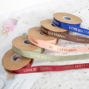 2.5cm gold-stamped grosgrain ribbons with Love Is Eternal text for flower bouquets