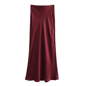 Detailed view of elegant wine red satin midi skirt with glossy texture and smooth drape