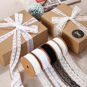 Elegant black and white lace ribbons for wedding gift wrapping and DIY crafts