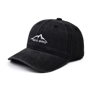 Close-up of black washed cotton baseball cap with BIG BRO embroidery and mountain icon