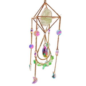 Golden moon suncatcher with green fluorite crystal prisms and hanging geometric accents