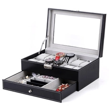 Detail view of double-layer black jewelry and watch box with grey velvet lining