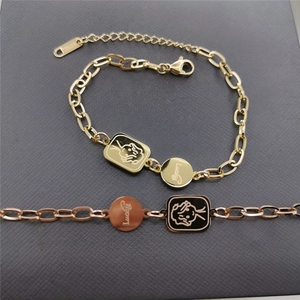 Lucky angel stainless steel chain bracelet with gold and rose gold charms