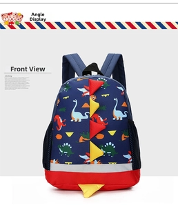 Front view of navy blue cartoon dinosaur backpack with red safety reflective stripe