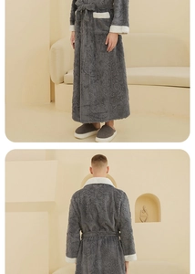 Detail of plush grey fleece bathrobe with white contrast trim and textured jacquard fabric