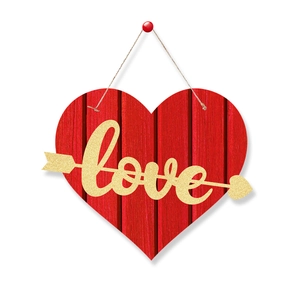 Detail of red wooden heart sign with golden glitter love text and hanging twine rope