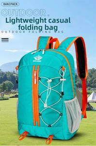 Close-up of lightweight outdoor folding backpack featuring bungee cords and side mesh pockets