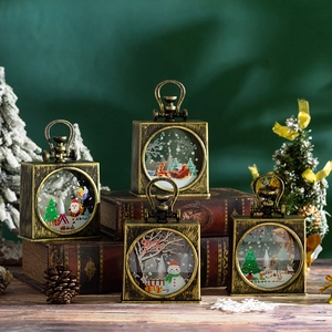 Close-up of vintage Christmas water lantern decorations with Santa and Snowman scenes