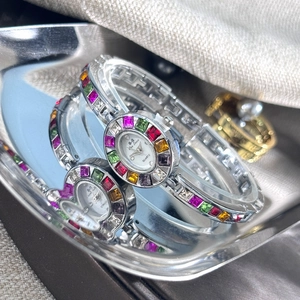 Elegant silver quartz watch with colorful zircon gemstones on a stylish bracelet band
