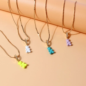 Fashionable copper bead necklaces featuring colorful bear pendants with crystal accents