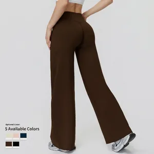 Women's high waist wide leg thermal sports trousers in dark brown from a back view