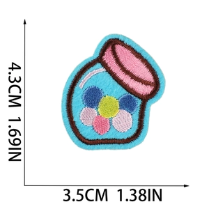 Detail size view of a candy machine embroidery patch measuring 4.3cm by 3.5cm
