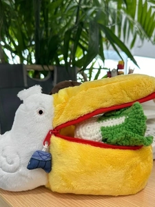 Creative pelican plush makeup bag with yellow beak zipper and soft white storage space