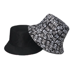 Fashionable skull bucket hat in black with white skeleton print for men and women