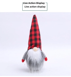 Detail of Christmas gnome with red and black buffalo check hat and white plush beard
