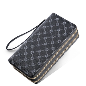 Detailed side view of dark grey long wallet with double zipper and floral pattern