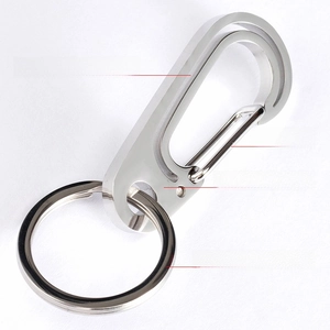 Macro detail of 304 stainless steel keychain with mirror polished finish and spring hook