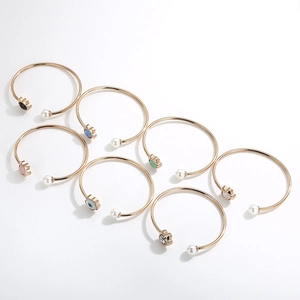 Elegant rose gold titanium steel bangles with colorful floral charms and pearls