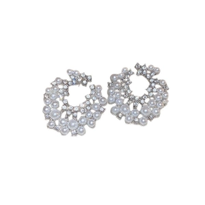 Elegant silver-toned flower pearl earrings with sparkling rhinestones in a circular design
