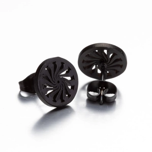 Vintage black geometric swirl stud earrings with a matte finish on a neutral surface
