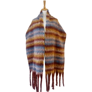 Detailed macro view of colorful striped knit scarf with thick tassels and mohair texture