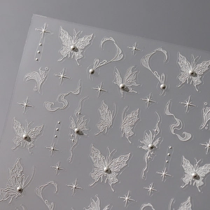 Stereo silver nail stickers with relief butterflies, cross stars, and small pearls