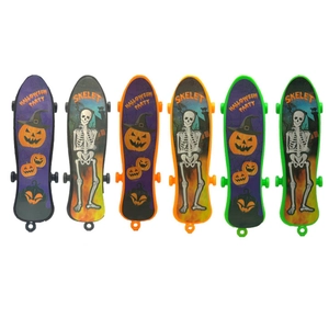 Mini plastic finger skateboards with Halloween pumpkin and skeleton prints for party favors
