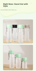 Close-up of portable frosted plastic cup with tea strainer and colorful carry rope