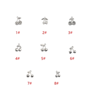 Set of 8 silver stainless steel cherry charms for DIY jewelry making on white background