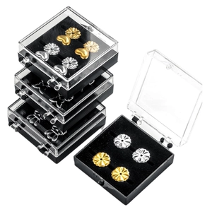 Stainless steel earring lifter set with gold and silver backings in transparent cases