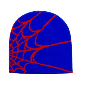 Y2K knit beanie featuring bold blue and red spider web jacquard pattern for winter