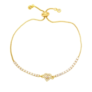 Close-up of golden bolo bracelet with pink heart gemstone and sparkling pavé zircon stones