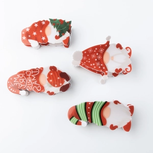Set of four 9cm Christmas Santa claw hair clips with festive gnome and star designs