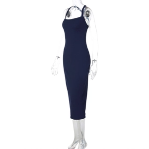 Detail view of navy blue knitted bodycon dress featuring a slim-fit halter neck design