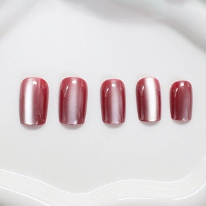 Deep red cat eye press-on nails with shiny magnetic finish and short square shape