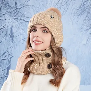 Winter knitted beanie and neck warmer set in beige with faux fur pom and button detail