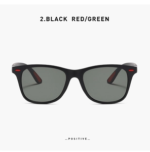 Front view of black and red polarized sport sunglasses with dark green lenses