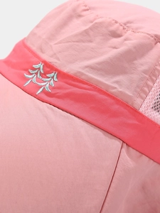 Detail of pink kids sun hat showing breathable mesh and tree embroidery on quick-dry fabric