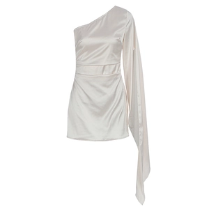 Detail of white satin one-shoulder mini dress featuring elegant long cape sleeve