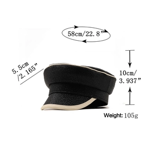 Retro black faux leather beret with snakeskin texture and cream piping detail