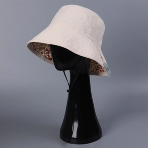 Waterproof nylon quick-dry beige bucket hat with red line pattern and windproof strap