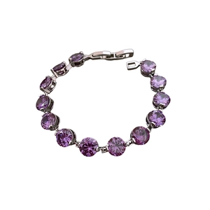 Elegant silver tennis bracelet with circular purple cubic zirconia stones for women