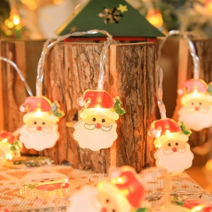 LED Christmas string lights with Santa Claus figures providing warm white festive glow