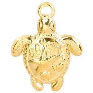 Close-up of golden turtle pendant with starfish and shell relief patterns