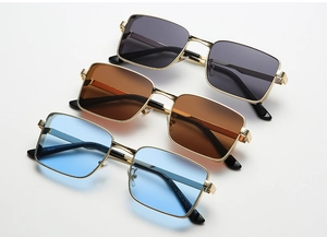Detailed stack of vintage square metal sunglasses in gold with grey brown and blue lenses