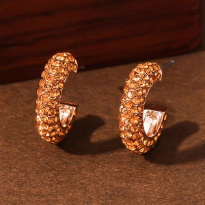 Fashionable semi-circle C-shaped hoop earrings with amber orange crystals and diamonds