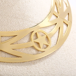 Exaggerated golden metal choker with hollow star designs and smooth geometric patterns
